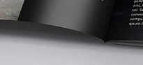 Bottom section of a self-cover brochures, predominantly black